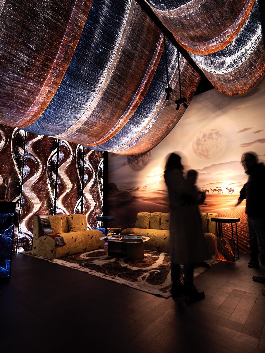 Patterned illuminated ceiling and walls in a lounge