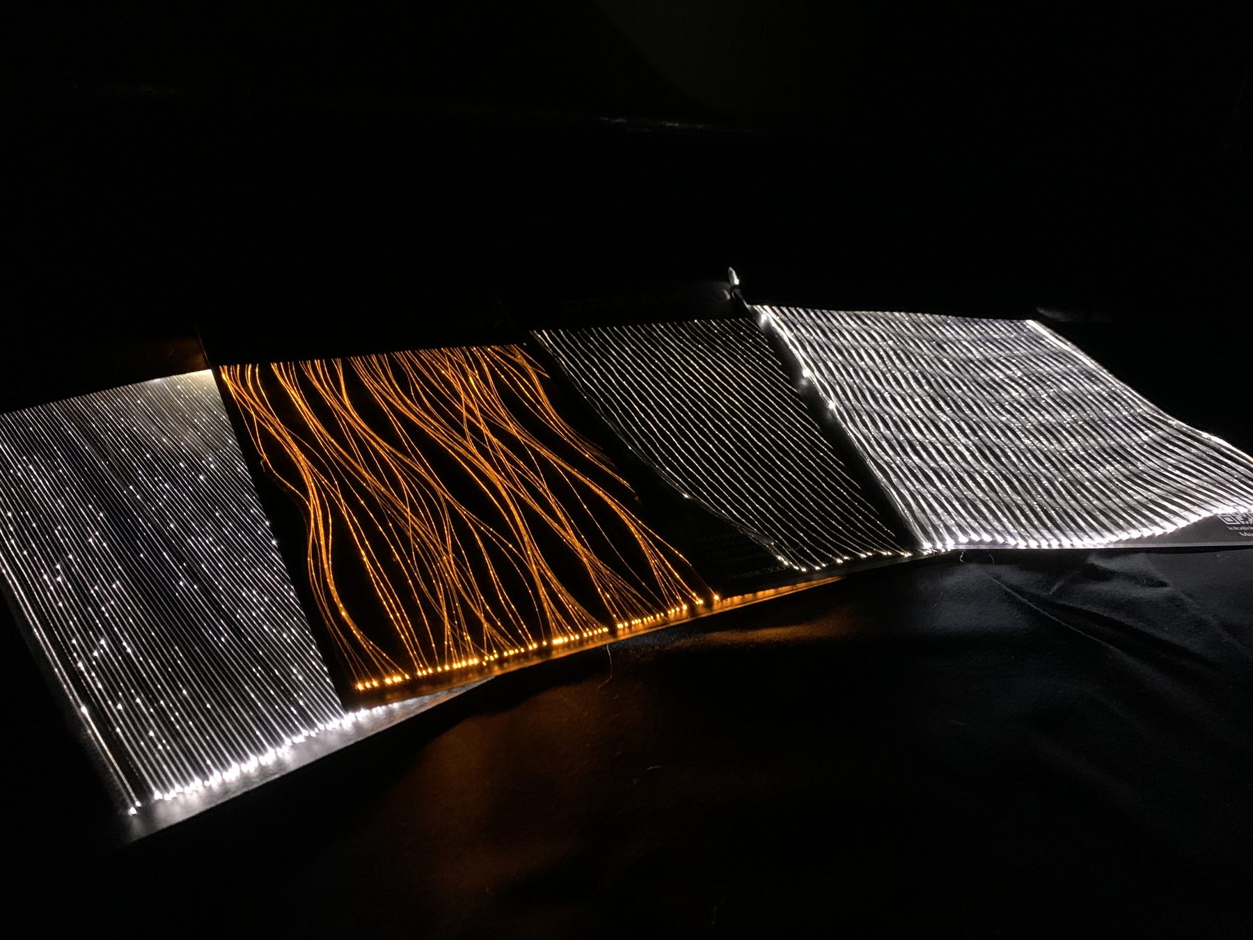An illuminated DreamLux fiber-optic textile installation